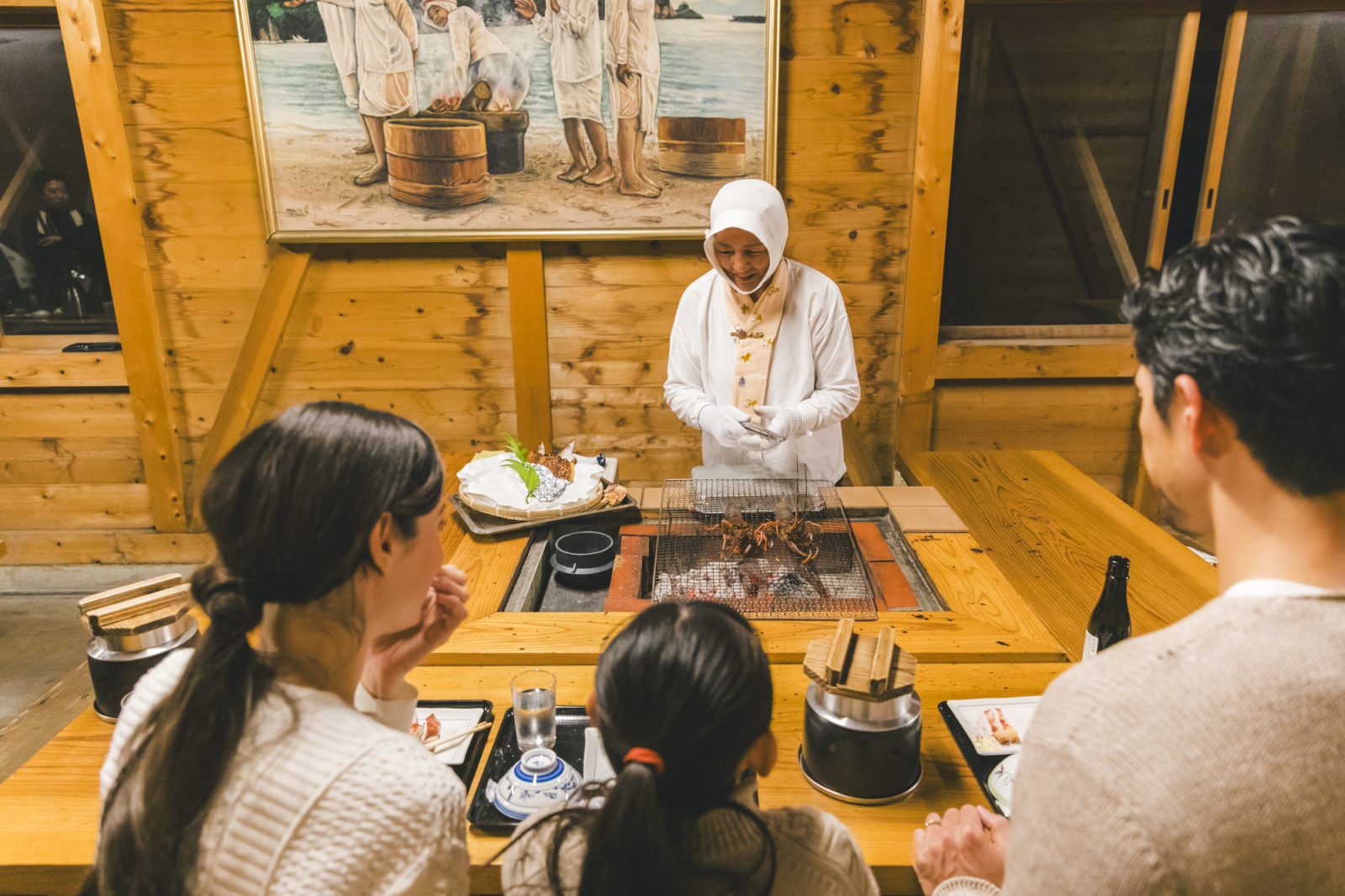 Seafood lunch served by divers in the hearth